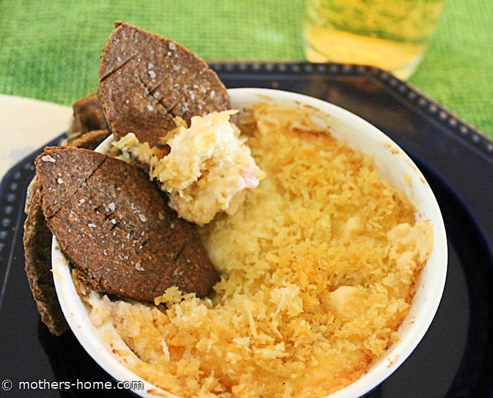 rye crackers and cheese dip plated horizontal